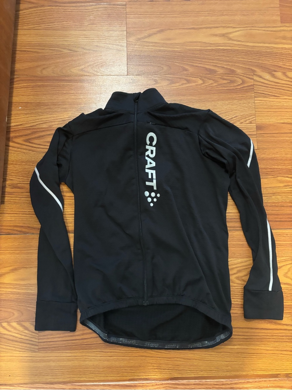 CRAFT Black Cycling Jacket with Reflective Detailing